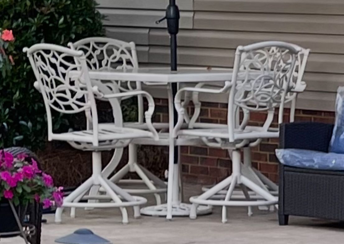 Patio Table Set With 4 Swivel Chairs