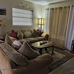 Hole Set Of Sofa, Love Seat, Coffee Table End Table, Rug, Lamp, And Curtains. 