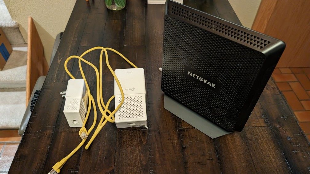 Netgear Nighthawk Modem Router Combo C7000 (Xfinity compatible) + Tplink Powerline Wifi Extender