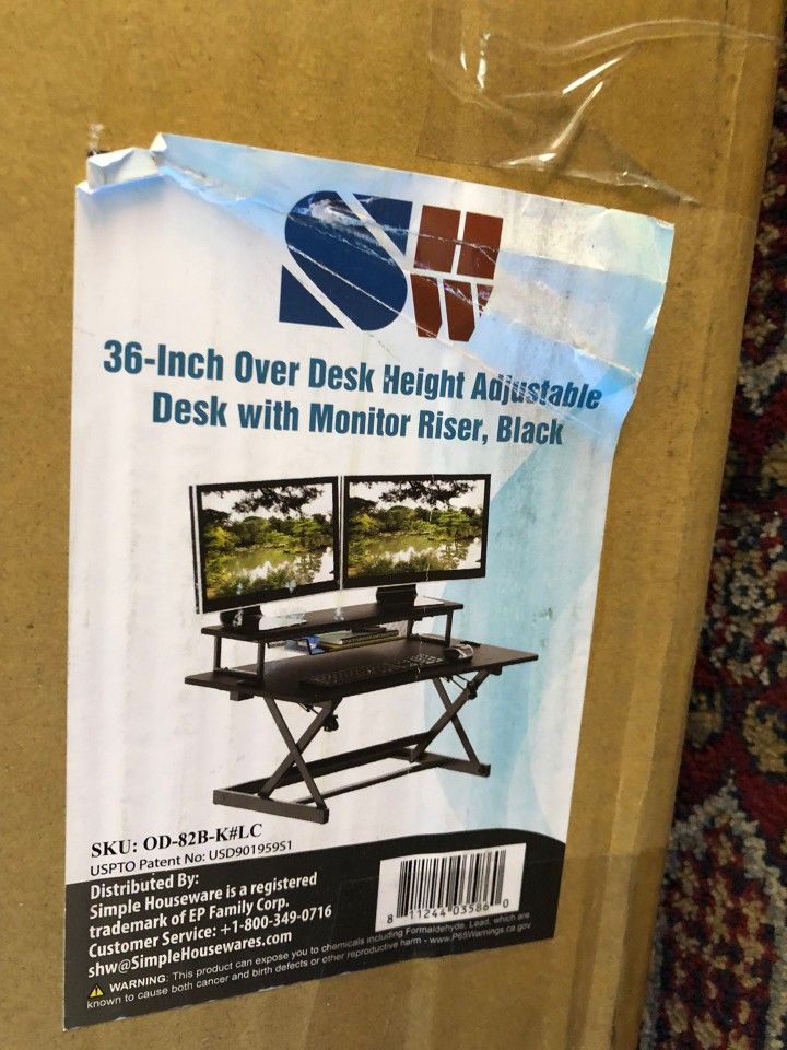 SHW 36 Inch Height Adjustable Standing Desk Sit to Stand Riser Converter Workstation, Black Retail $138 Plus Taxes And Shipping My Price Is Only 80$