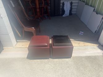 Dark brownish red storage ottomans in good condition $20 each.