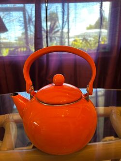 Orange metal Teapot with Arched Handle