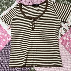 white and brown brandy button crop top