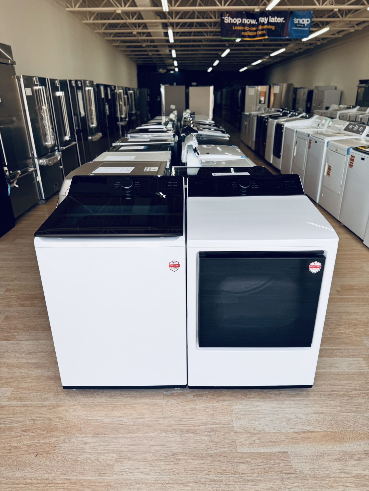 Brand new LG 5.5 cu. ft. top load washer (model WT8400CW) and 7.3 cu. ft. gas dryer with EasyLoad door and AI Sensor Dry (model DLG8401WE),