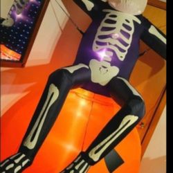 Halloween: 8' Totally Ghoul, Inflatable Air Blown Lighted Skeleton on Pumpkin, firm.