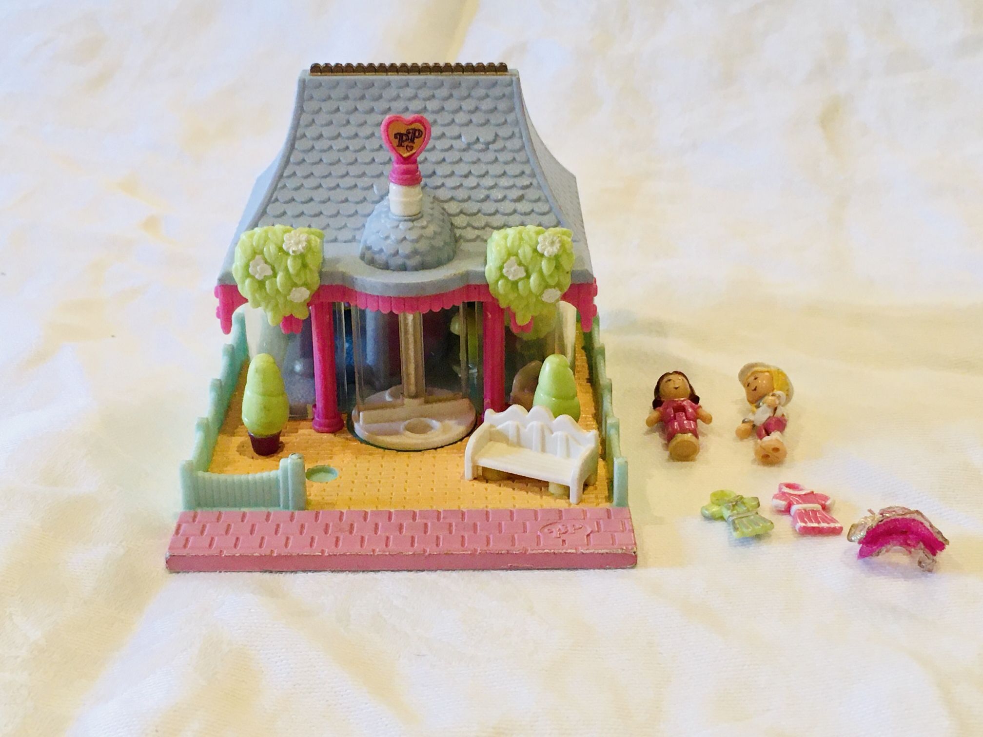 RARE find! Vintage Polly Pocket dress shop 1995.  Comes with two figures, a tutu, and two dresses. $125