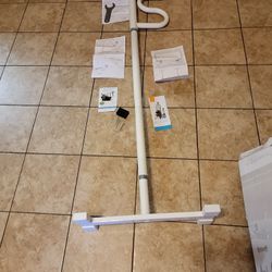 NEW SECURITY POLE € CURVE GRAB BAR.  $150. FIRM PRICE 
