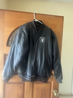 Vintage Raiders bomber/varsity jacket in size Large.