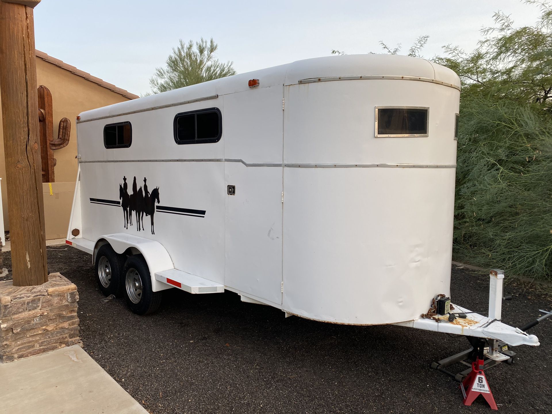 4 horse slant enclosed trailer with tack room. Brand new tires. Saddle and tack available.