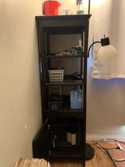 Black Wood Bookshelf with Cabinet and Lamp