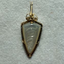 Hand Carved Mother Of Pearl Tiki Arrowhead Pendant