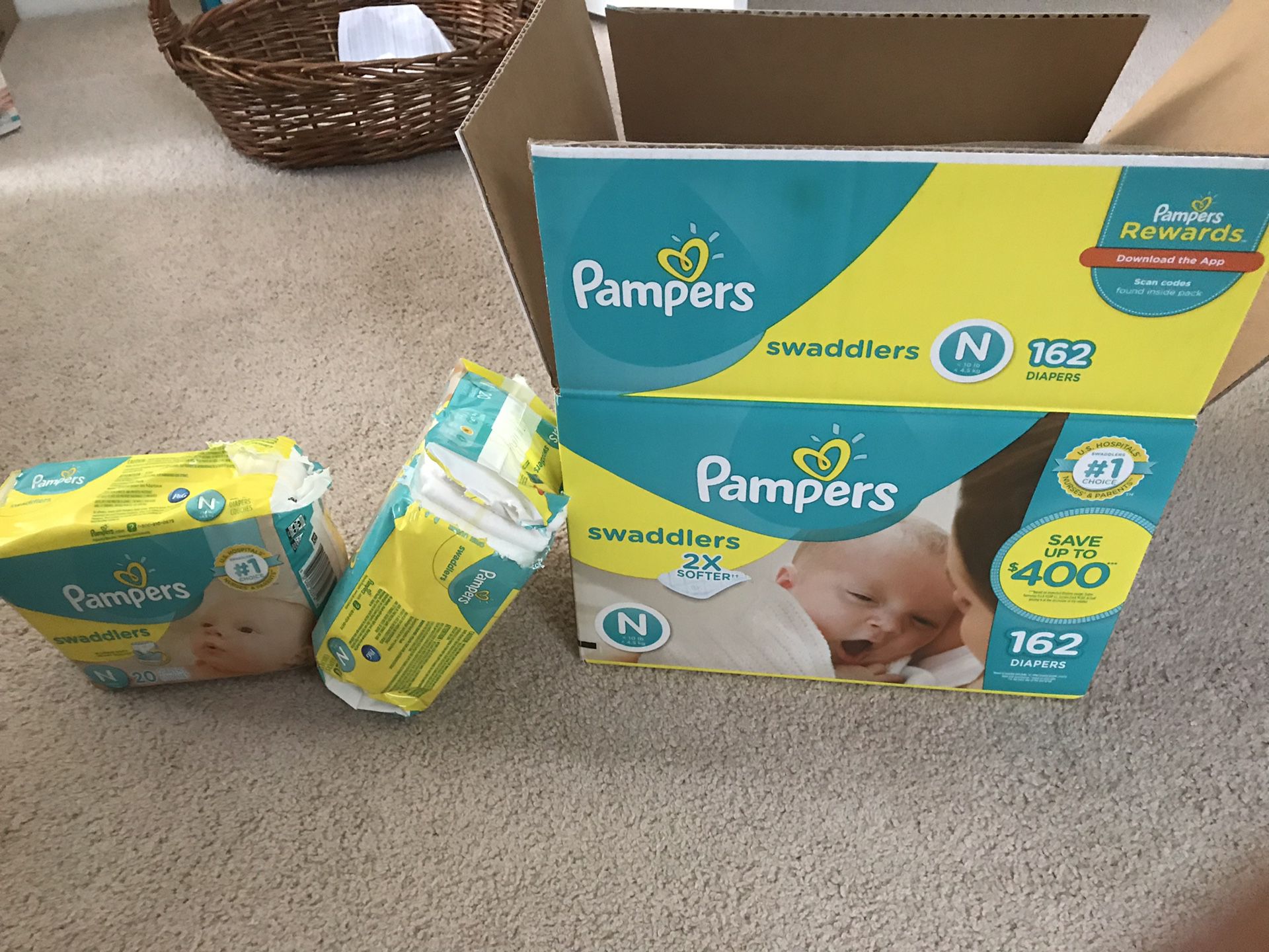 Newborns Pampers diapers ( about 195 counts)