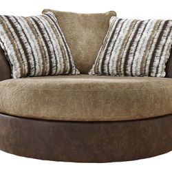 Alesbury Chocolate 
Oversized Swivel Accennt Chair $10  Down Payment Only