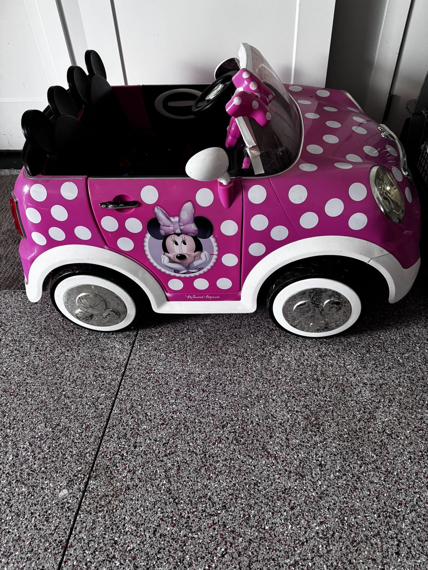 Electric Car For Child, Minnie Mouse Version.  Works Great.  Some Cosmetic Blemishes.  Includes Charger Cord.  Retails Over $300