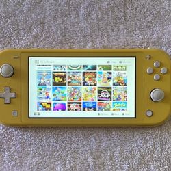 NINTENDO SWITCH LITE with 100 SWITCH GAMES INCLUDED
