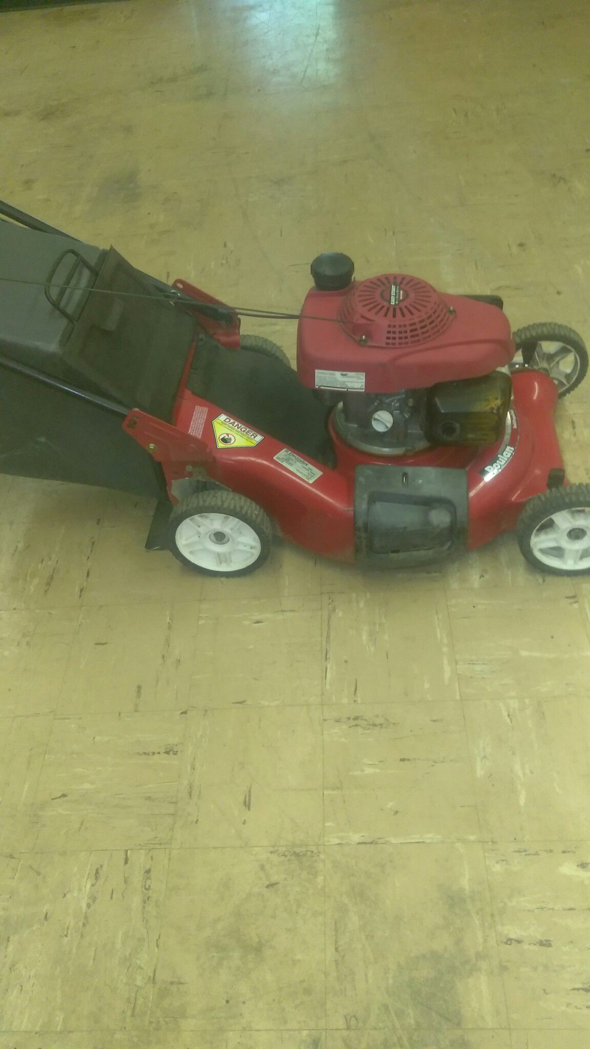 Honda self-propelled lawn mower with a bag