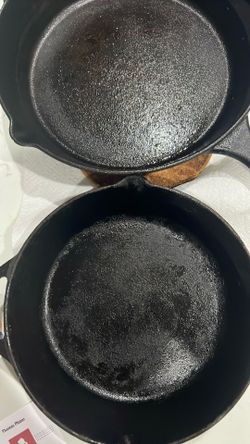 Cast iron skillets.  2  New Skillets 