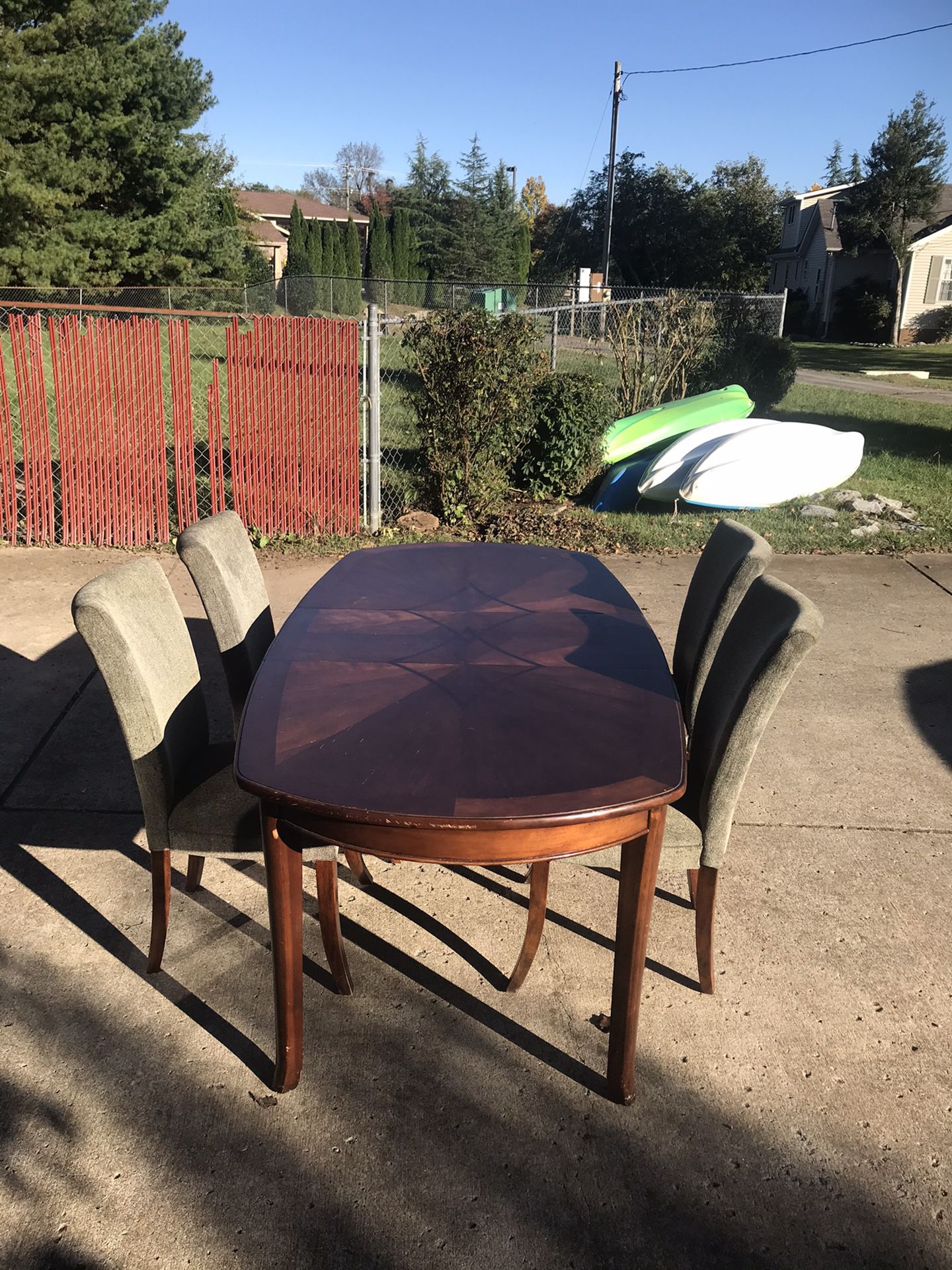Dining room table and 4 chairs and armoire cabinet