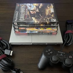 Sony PS2 Slim & 4 Games!!