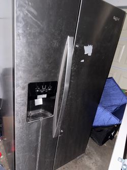 Whirlpool side by side refrigerator