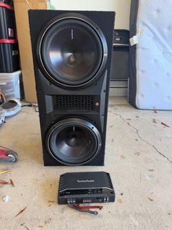 Rockford Fosgate R2-1200X1 amp + two Rockford Fosgate P3 subwoofers in a ported enclosure