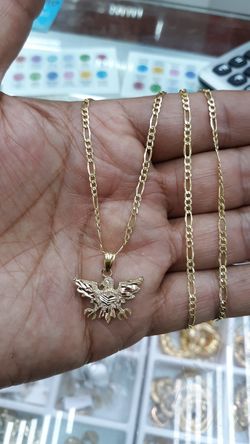 14k gold & charm 4.8 grams 22 inch long