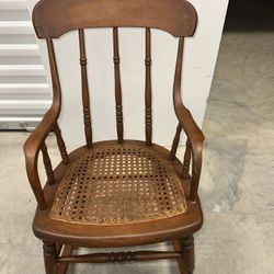 Antique wchild’s hand carved wooden rocking chair