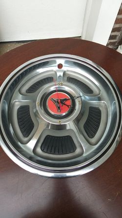 Plymouth Tire Hub Cap Clock
