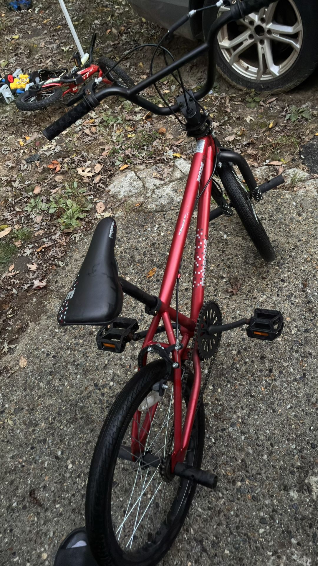 BMX Red mongoose bike with pegs front and back
