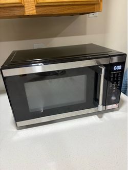 Microwave Brand new use a couple times had it 5 months