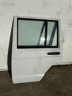 Jeep Cherokee XJ Rear Driver Door White OEM Manual Window 1984 through 1996