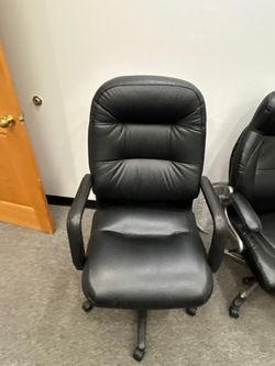 Assortment of office chairs and desks