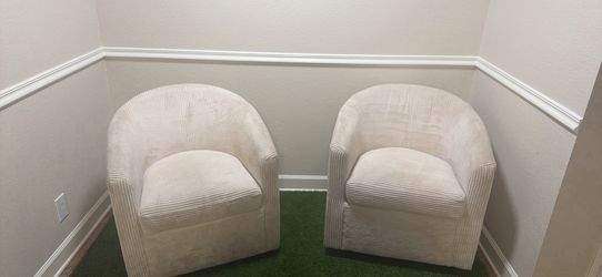 Two swivelled sitting chairs