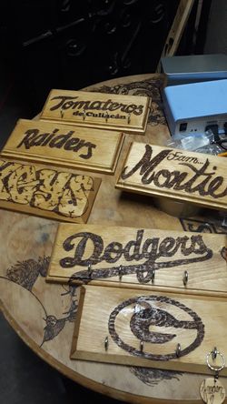 Wood burning key chain hangers or keychains ask for prices