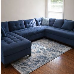 Large blue sectional couch
