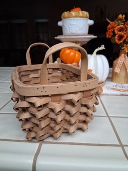 Vintage Handwoven Splitwood Porcupine Curl Basket with Double Rivetted Wooden Handle. Wonderfully Crafted....asking $25.00