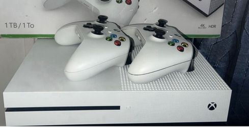 Xbox 1TB memory with 2 wireless controllers like new condition 