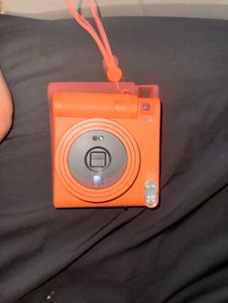 Orange instax SQ1 instant camera