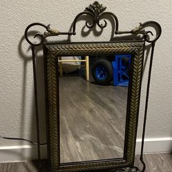 Metal frame wall mirror