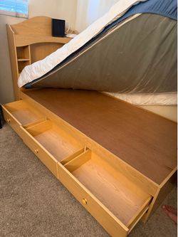 captain storage bed) with a bookcase headboard.