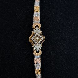 Sterling Silver Bracelet Accented With 2 Tones Of Gold,  Made In Italy,7"