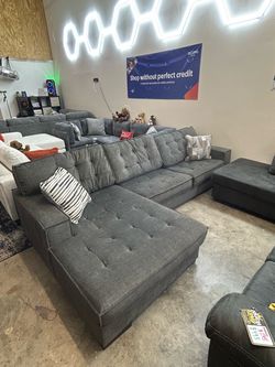 Large Gray Tufted Sectional Sofa with Chaise
