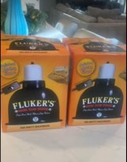 Brand new, never opened Fluker Mini Sun Dome light for reptile tank.