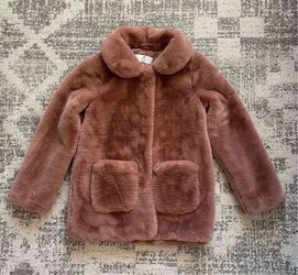 Girl’s collared faux fur coat from H&M in a dusty pink shade, size 10