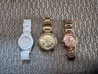 Nixon watches  used in working condition .