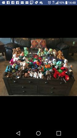 Over 150 mint condition beanie babies.