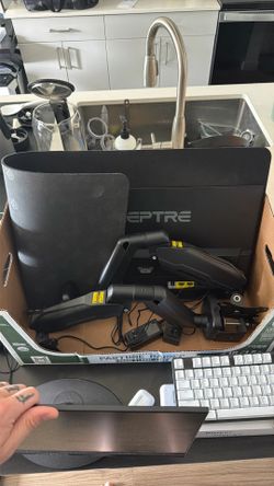 2 monitors with desk mounts and a XL mouse pad