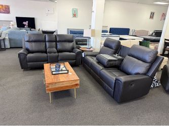 Black reclining Ashley sofa and loveseat