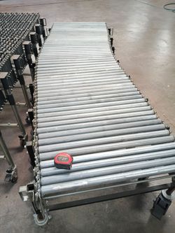 Three (3) separate according style conveyors