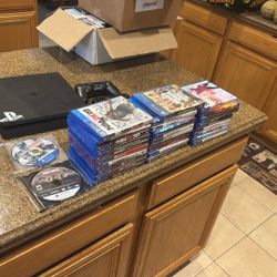 PS4 with (31 Games) Two Controllers